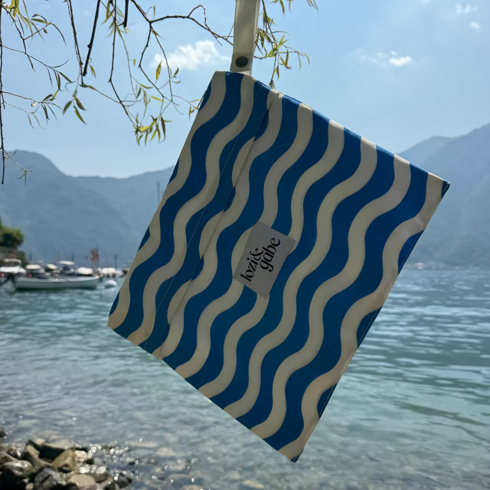 blue and white wavey stripe wet bag